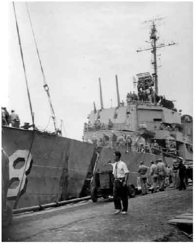 Bow being separated from main part of destroyer.